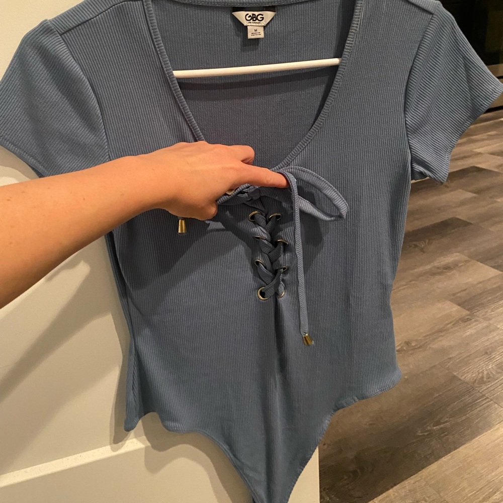 blue bodysuit